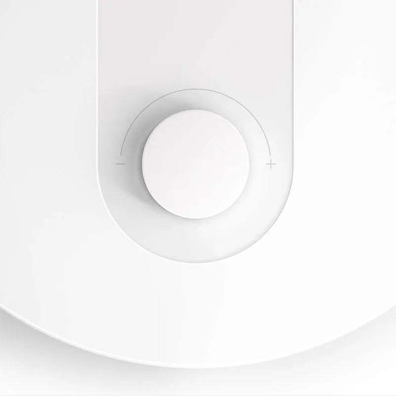 Xiaomi Mi LED Desk Lamp 1S cận cảnh núm xoay chỉnh độ sáng trên đế đèn màu trắng